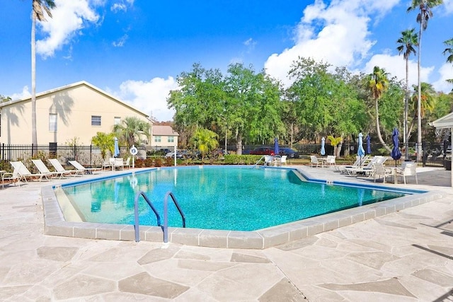 view of pool featuring a patio