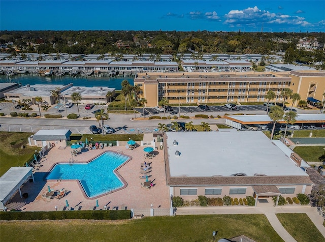 birds eye view of property with a water view