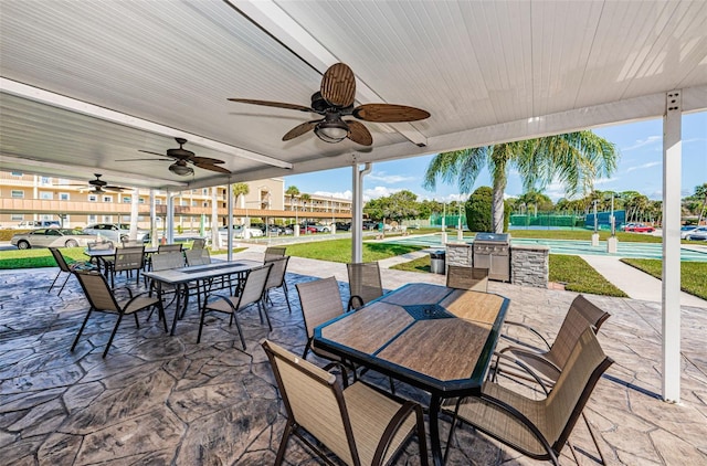 view of patio featuring a grill