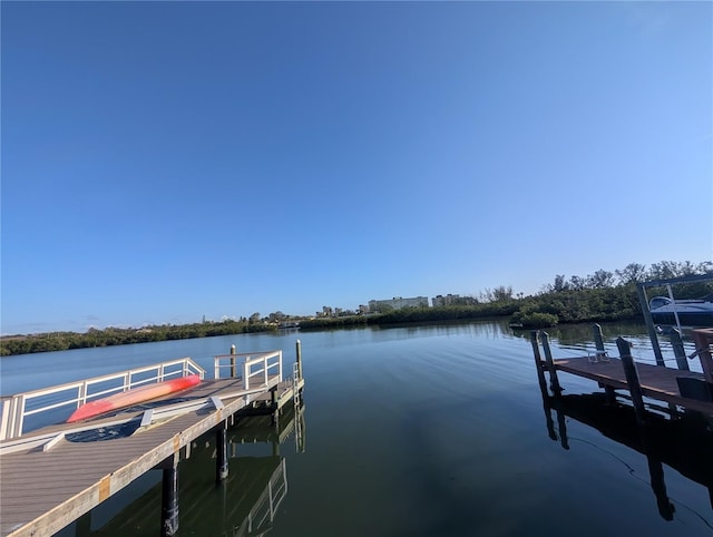 dock area featuring a water view