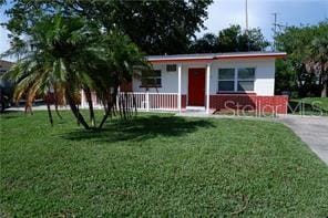 view of front of home with a front yard