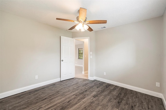 unfurnished room with wood-type flooring and ceiling fan