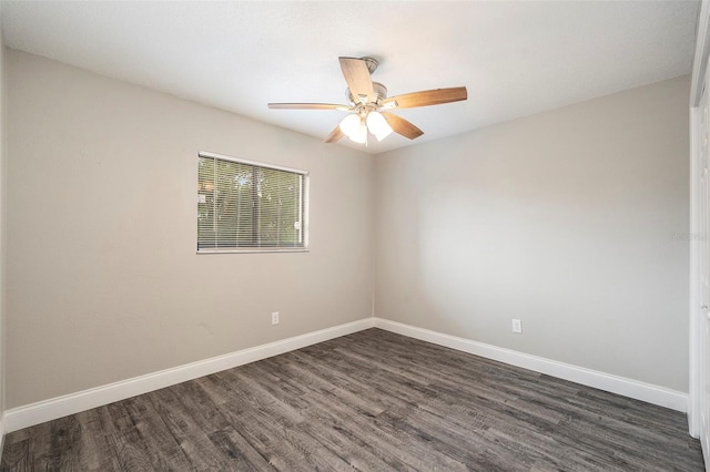 unfurnished room featuring dark hardwood / wood-style flooring