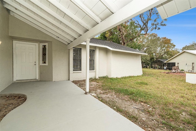 view of property exterior featuring a yard