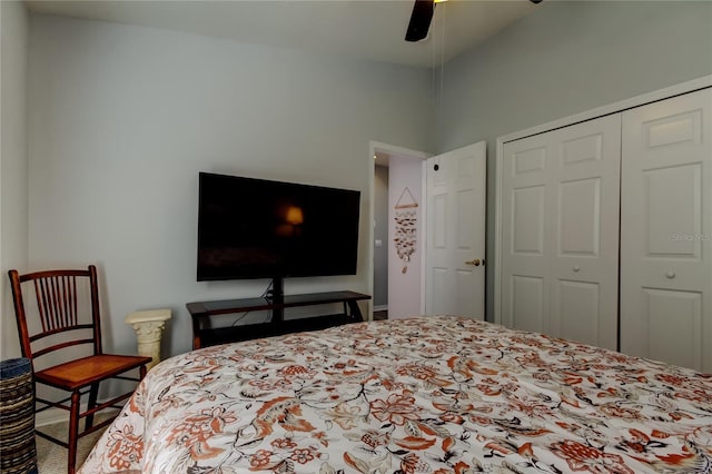 bedroom featuring ceiling fan and a closet