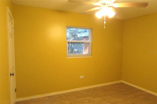 unfurnished room with ceiling fan