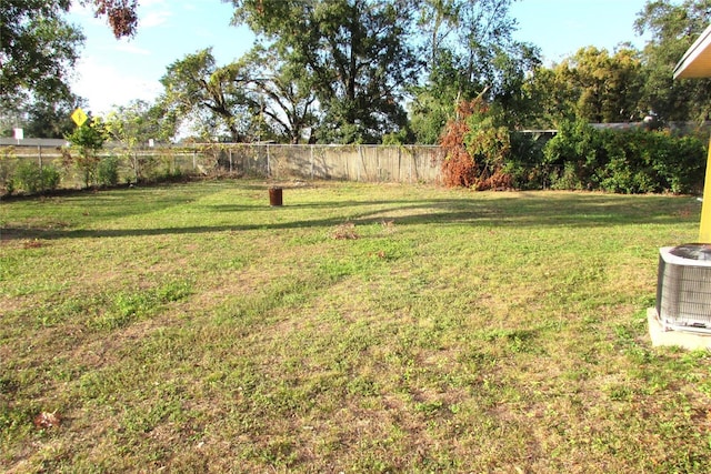 view of yard featuring central AC