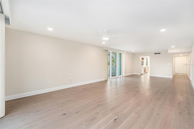 unfurnished living room with ceiling fan and light wood-type flooring