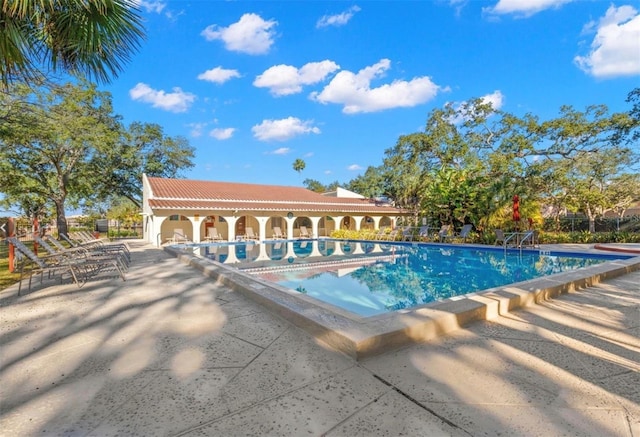 view of pool with a patio