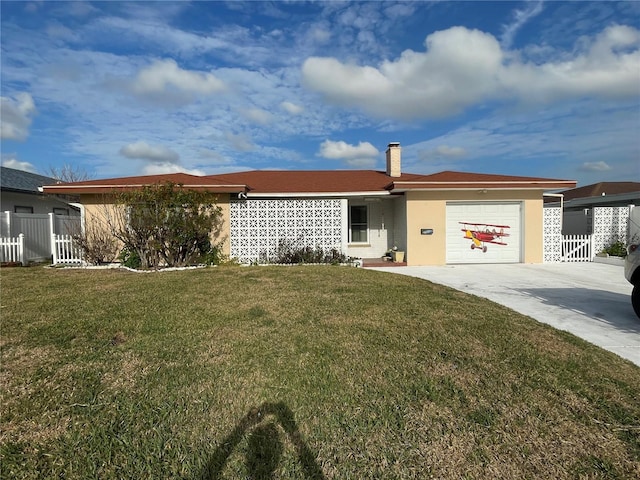 single story home featuring a garage and a front yard