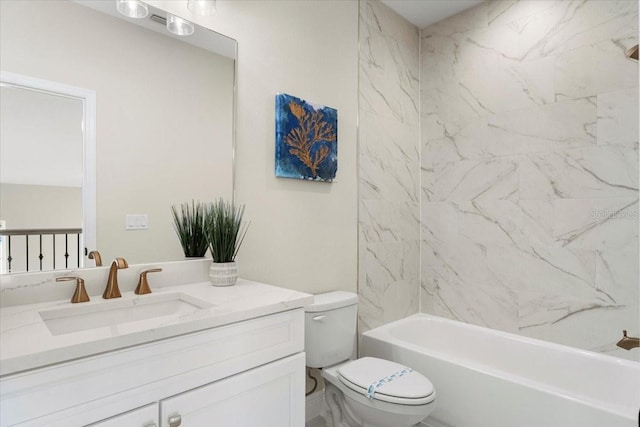 full bathroom with vanity, toilet, and tiled shower / bath combo