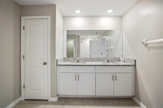 bathroom featuring vanity and tile patterned floors