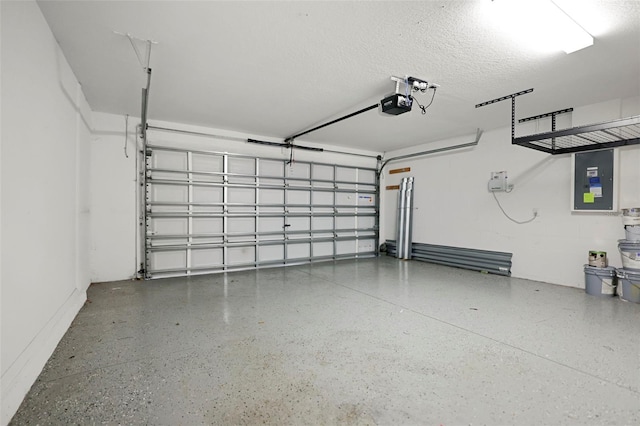 garage with electric panel and a garage door opener