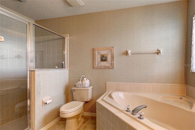 bathroom with tile patterned flooring, independent shower and bath, and toilet