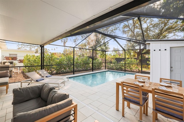 view of swimming pool with a patio, glass enclosure, and an outdoor living space