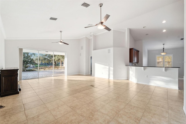 unfurnished living room with light tile patterned floors, vaulted ceiling, ceiling fan, and crown molding