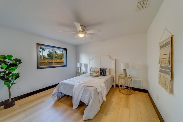 bedroom featuring ceiling fan and light wood-type flooring