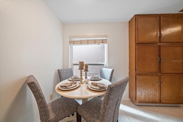 view of tiled dining space