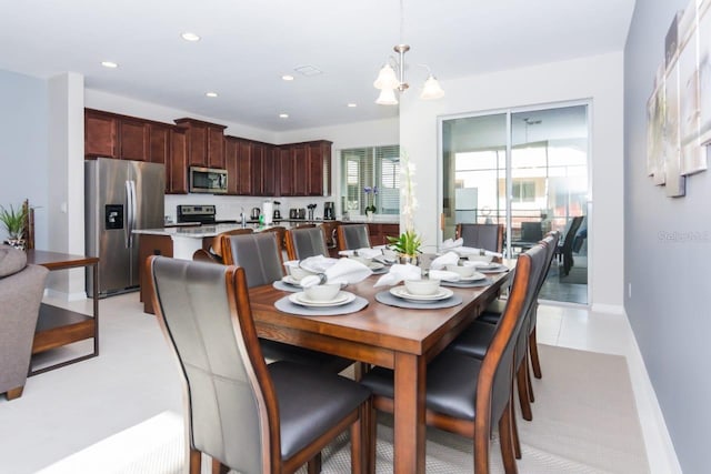 dining area with a notable chandelier