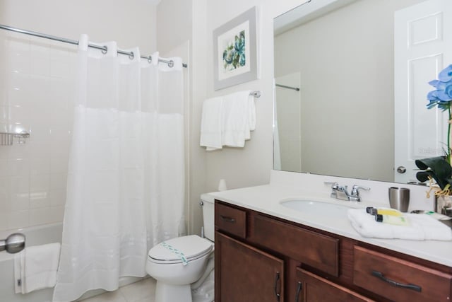 full bathroom featuring tile patterned floors, vanity, toilet, and shower / bath combo with shower curtain