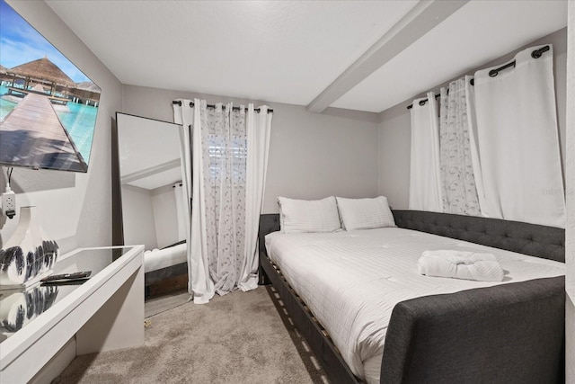 bedroom featuring light colored carpet