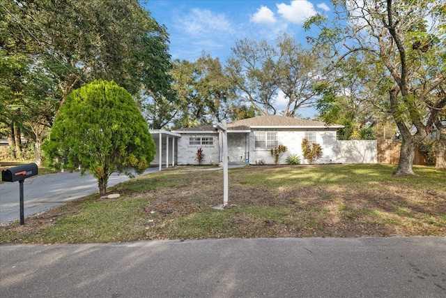 1504 E Mcberry St, Tampa, FL 33610 - single story home with fence and a front lawn