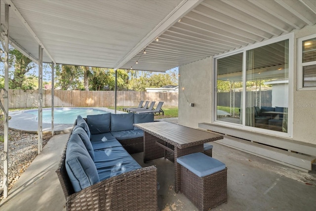1504 E Mcberry St, Tampa, FL 33610 - view of patio / terrace featuring a fenced backyard, an outdoor hangout area, and a fenced in pool