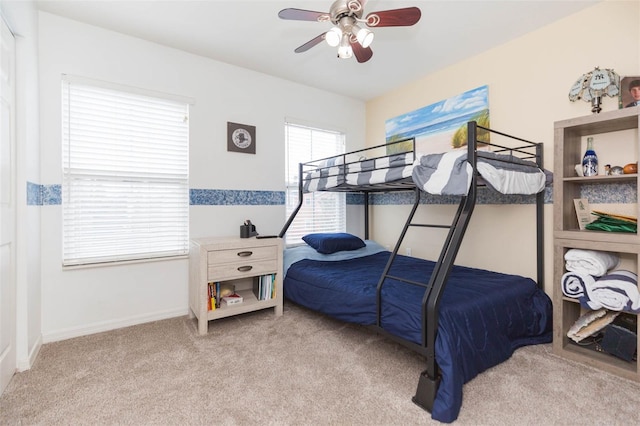 bedroom with carpet flooring and ceiling fan