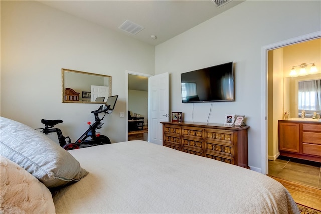 bedroom with light wood-type flooring