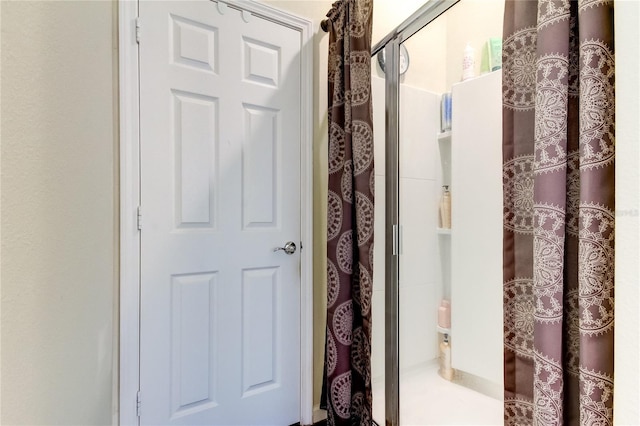 bathroom with a shower with curtain