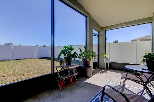 sunroom with lofted ceiling