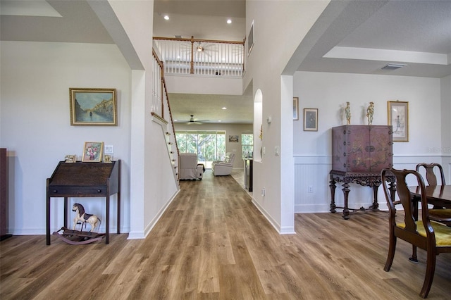 hallway with wood-type flooring