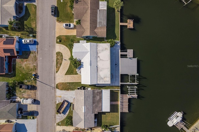 bird's eye view with a water view