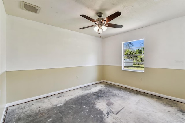 unfurnished room with concrete floors and ceiling fan