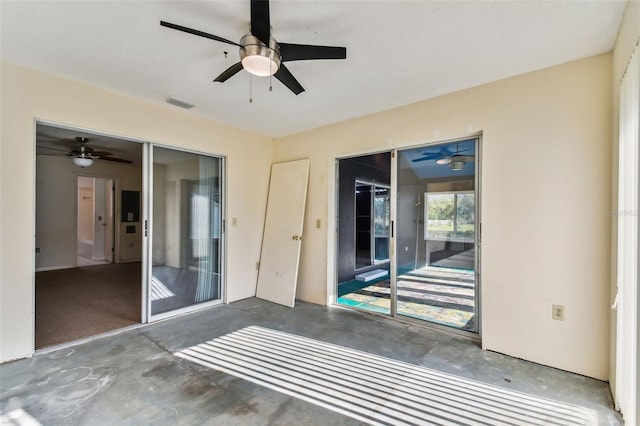 interior space featuring ceiling fan