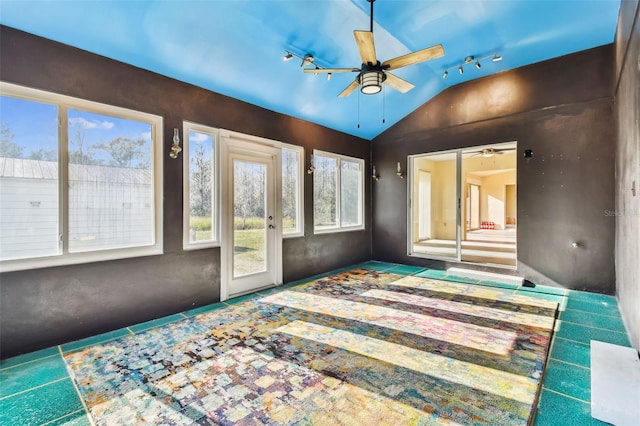 bedroom featuring ceiling fan and vaulted ceiling