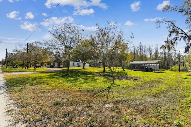 view of yard with a carport