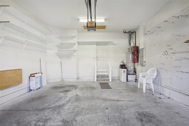 garage featuring electric panel, a garage door opener, and gas water heater