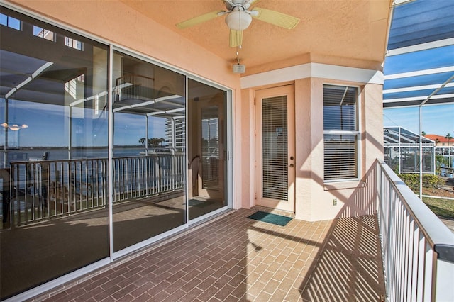 balcony featuring ceiling fan