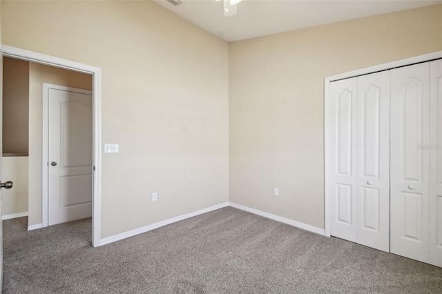 unfurnished bedroom with a closet and carpet