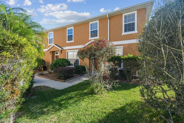 view of front of home with a front yard