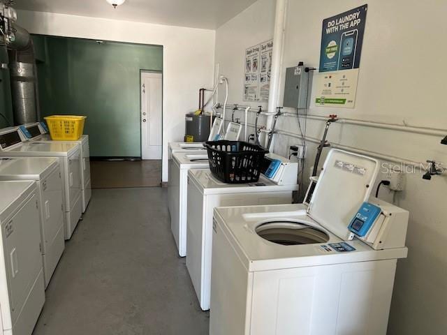 community laundry room with washer and clothes dryer