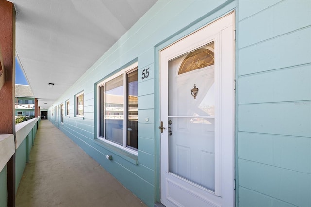 entrance to property featuring covered porch