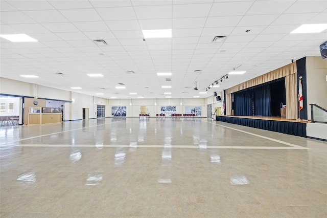 miscellaneous room with a paneled ceiling and visible vents