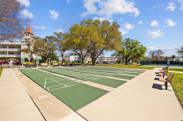 view of home's community with shuffleboard