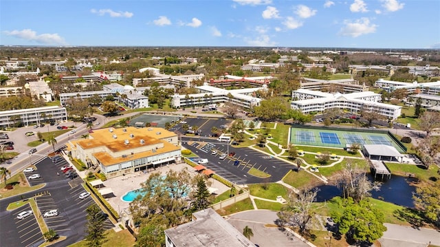 bird's eye view with a water view