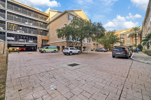 view of road with sidewalks and curbs