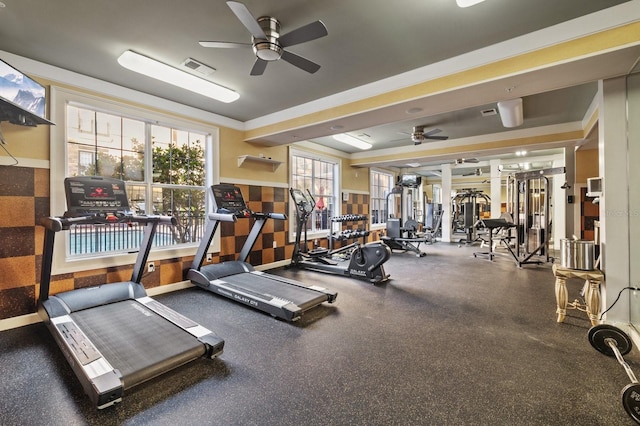 workout area with visible vents and ceiling fan