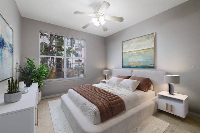 bedroom with a ceiling fan and baseboards