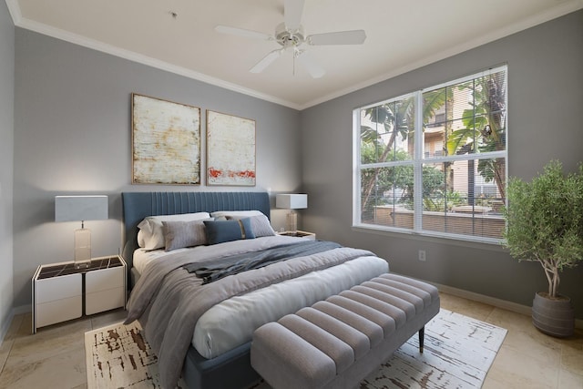 bedroom featuring ornamental molding, baseboards, and a ceiling fan